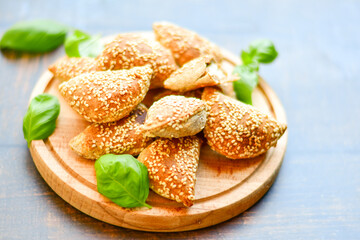 Fresh baked home made whole wheat  Gliten free  Mini cheese  puff pastries  .Cheese pie with phyllo pastry and herbs