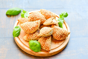 Fresh baked home made whole wheat  Gliten free  Mini cheese  puff pastries  .Cheese pie with phyllo pastry and herbs