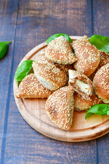 Fresh baked home made whole wheat  Gliten free  Mini cheese  puff pastries  .Cheese pie with phyllo pastry and herbs