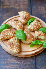 Fresh baked home made whole wheat  Gliten free  Mini cheese  puff pastries  .Cheese pie with phyllo pastry and herbs