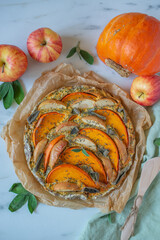 home made pumpkin quiche on a table