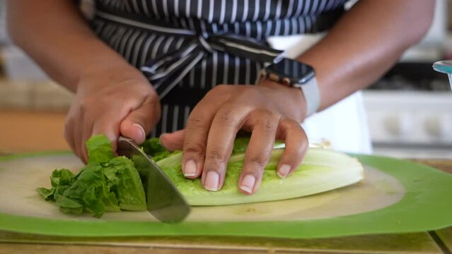 Cutting romaine lettuce for a chopped salad - ANTIPASTO SALAD SERIES