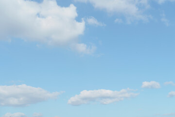 Beautiful clouds during spring time in a Sunny day. Blue sky and white fluffy clouds