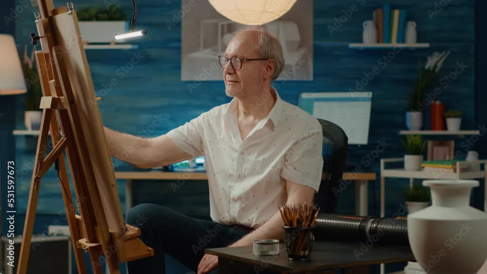 Aufkleber senior man drawing vase model on canvas with artistic tools and skills, looking at inspiration desig