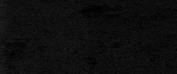 Black cotton fabric texture background, seamless pattern of natural textile, panorama of vintage black cloth texture and seamless background.	