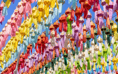 Fototapeta na wymiar colorful hanging lanterns lighting in loy krathong and new year festival at northern of thailand