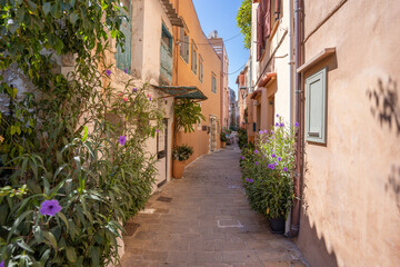 traditional small narrow alley in greek town Chania on island Crete