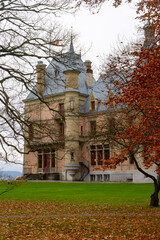 Naklejka premium Schadau park and castle , beautiful scenic area and Schloss Schadau near lake Aare during autumn , winter cloudy day : Thun , Switzerland : December 2 , 2019