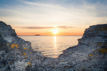 sunset by Byrums raukar sea horizon cliff formations
