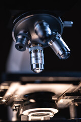 professional scientific equipment microscope for medicine scientist using in biotechnology science laboratory, biology or chemistry and medical technology research with microbiology experiment