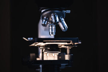 professional scientific equipment microscope for medicine scientist using in biotechnology science laboratory, biology or chemistry and medical technology research with microbiology experiment