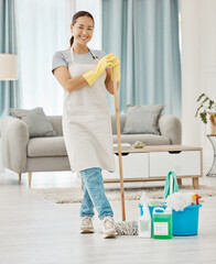 Cleaning floor, house work and woman working in home service mopping living room, doing job with...