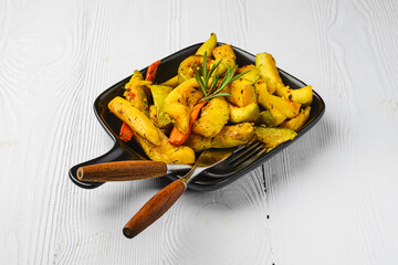 Spicy pumpkin and carrot on ceramic plate