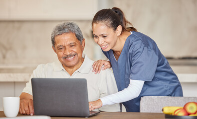 Happy nurse help senior man with laptop, showing how to make a video call or search the internet in an assisted living home. Senior patient enjoying time with healthcare worker, reading online news