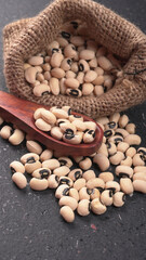 Uncooked black eyed peas. Health food concept.