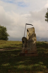 Death statue with scythe