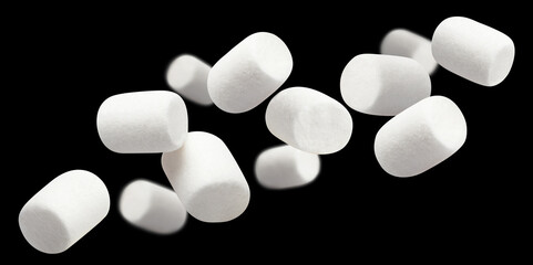 Flying marshmallows, isolated on black background