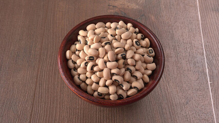 Uncooked black eyed peas. Health food concept.
