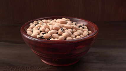 Uncooked black eyed peas. Health food concept.