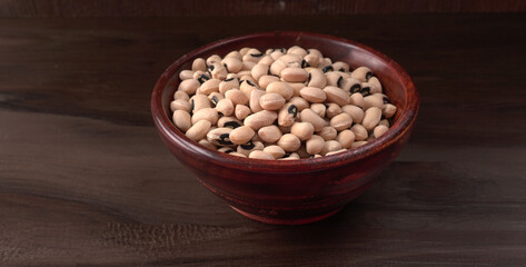 Uncooked black eyed peas. Health food concept.