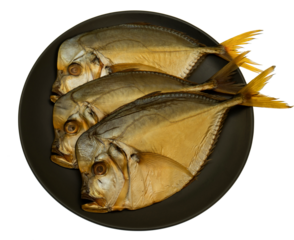 Smoked Vomer fish on a black plate
