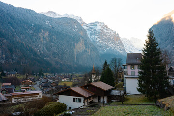 Lauterbrunnen , Picturesque villages , town and valleys of Alps . Nice Staubbach Falls , Kirche , nature during autumn, winter : Lauterbrunnen , Switzerland : December 3 , 2019