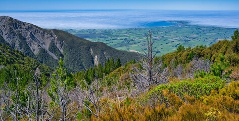 View down to the Kaikoura Peninsula in the clouds, New Zealand