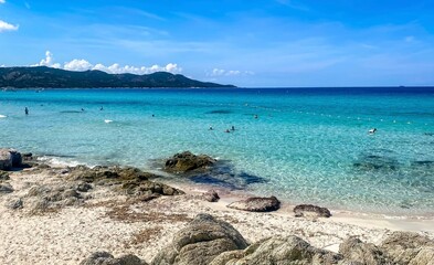 Obraz premium View from the path to the beautiful Saleccia beach (Plage de Saleccia) near Saint Florent. Beach with crystal clear sea water, Corsica, France.
