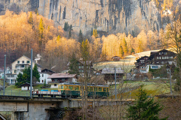 Lauterbrunnen , Picturesque villages , town and valleys of Alps . Nice Staubbach Falls , Kirche , nature during autumn, winter : Lauterbrunnen , Switzerland : December 3 , 2019