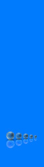 Five balls of metal of different sizes of blue color on blue background. Growth of something. Progress. Reflection. Vertical banner for insertion into site. Place for text cope space