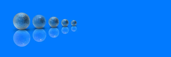 Fototapeta na wymiar Five balls of metal of different sizes of blue color on blue background. Growth of something. Progress. Reflection. Horizontal image. Banner for insertion into site. Place for text cope space
