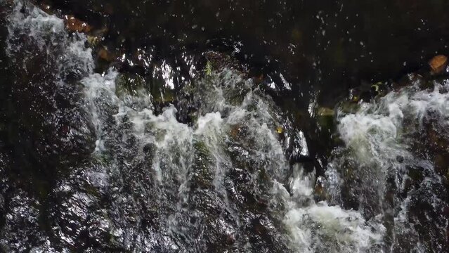 Topdown of Ambleve water stream and rocks in the Belgian Ardennes