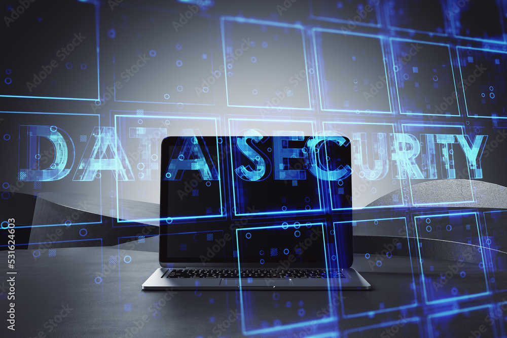 Poster close up of laptop computer with creative blue cubes data security text hologram on blurry backgroun