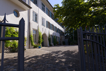 Andelfingen Castle at rural village Andelfingen on a sunny summer day. Photo taken July 12th, 2022, Andelfingen, Switzerland.