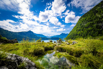 Fototapeta na wymiar Breathtaking view of the alpine Altausseer See (Lake Aussee) in Ausseer Land region, Styria, Austria, with the Dachstein glacier in the background