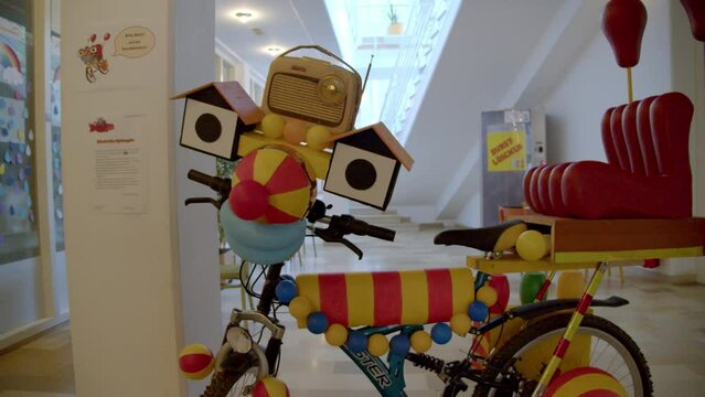 Tom Turbo Bicycle Character Model Display Inside A Building. - close up
