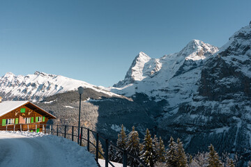 Murren , Swiss mountain village near Schilthorn  and Lauterbrunnen during winter sunny day : Murren , Switzerland : December 3 , 2019