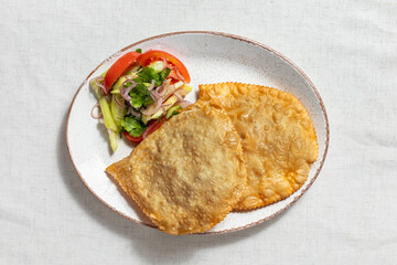 Chebureki with salad