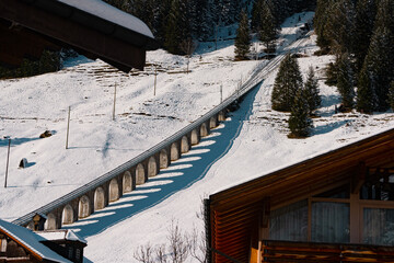 Funicular railway in Murren , Swiss mountain village near Schilthorn  and Lauterbrunnen during...