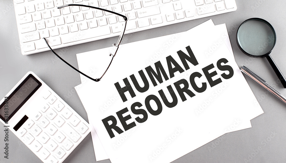 Poster human resources text on paper with keyboard, calculator on grey background
