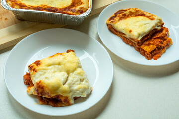 Two servings of lasagne on a plate