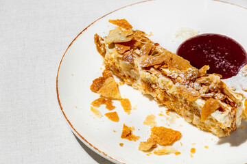 Piece of cake Napoleon with raspberry jam