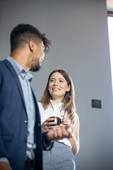 Two business people on coffe brake, discussing about company growth