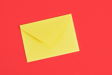 mock up yellow envelope on red background