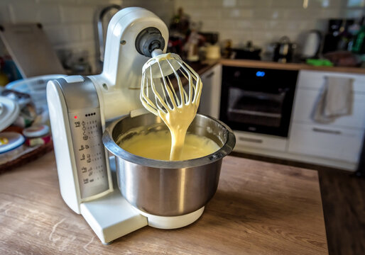 Kitchen Robot (food Processor) Mixer In The Process Of Making Cake Cream.