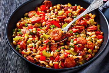 Hoppin John of black-eyed peas, veggies, sausages