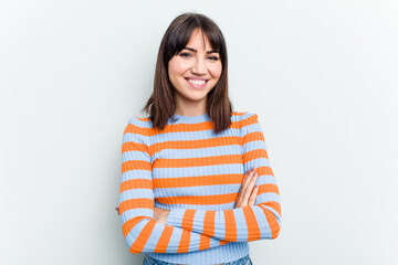 Fototapeta premium Young caucasian woman isolated on white background who feels confident, crossing arms with determination.