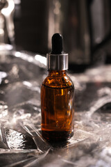 beauty product in glass brown bottle with dropper mockup