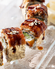 rolls with eel avocado in sauce