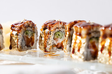 rolls with eel avocado in sauce
